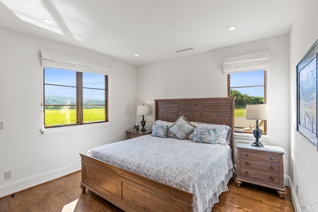 7035 Silverado Trl, Napa, CA 94558 - bedroom featuring wood finished floors, baseboards, and recessed lighting