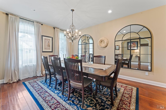 1261 Landmark Dr, Vallejo, CA 94591 - dining space featuring a chandelier, wood-type flooring, and baseboards