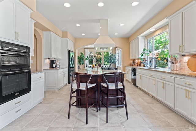 1261 Landmark Dr, Vallejo, CA 94591 - kitchen featuring a sink, black appliances, backsplash, a center island, and recessed lighting