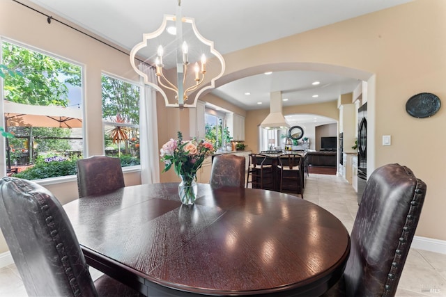 1261 Landmark Dr, Vallejo, CA 94591 - dining room with arched walkways, light tile patterned flooring, healthy amount of natural light, a chandelier, and recessed lighting