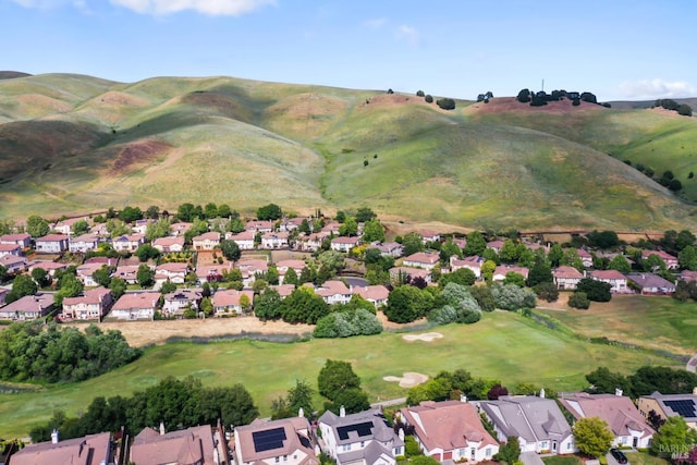 1261 Landmark Dr, Vallejo, CA 94591 - aerial overview of property's location with nearby suburban area, a mountain backdrop, and a golf course