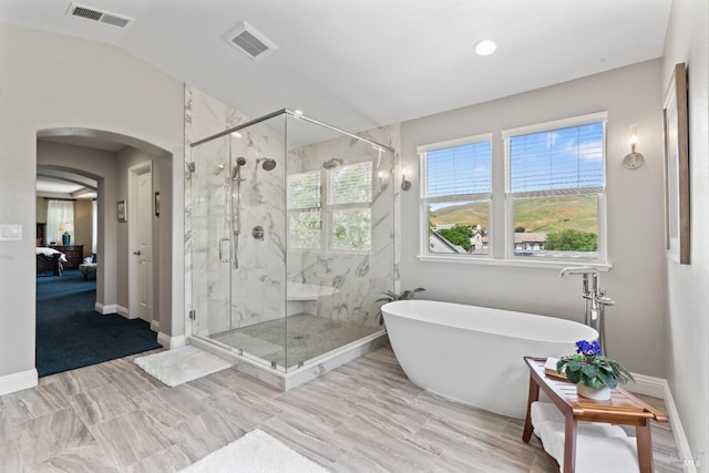 1261 Landmark Dr, Vallejo, CA 94591 - ensuite bathroom with a soaking tub, baseboards, and a marble finish shower