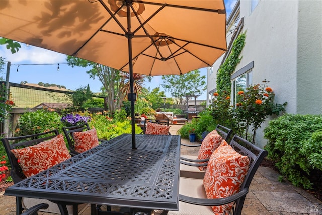 1261 Landmark Dr, Vallejo, CA 94591 - view of patio / terrace with outdoor dining area and fence