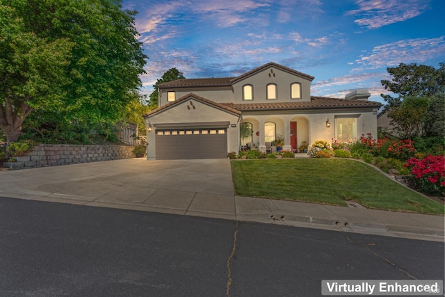 1261 Landmark Dr, Vallejo, CA 94591 - mediterranean / spanish home featuring stucco siding, concrete driveway, a lawn, a garage, and a tiled roof