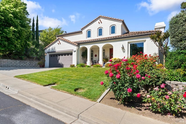 1261 Landmark Dr, Vallejo, CA 94591 - mediterranean / spanish-style house with stucco siding, a front yard, a garage, a porch, and concrete driveway