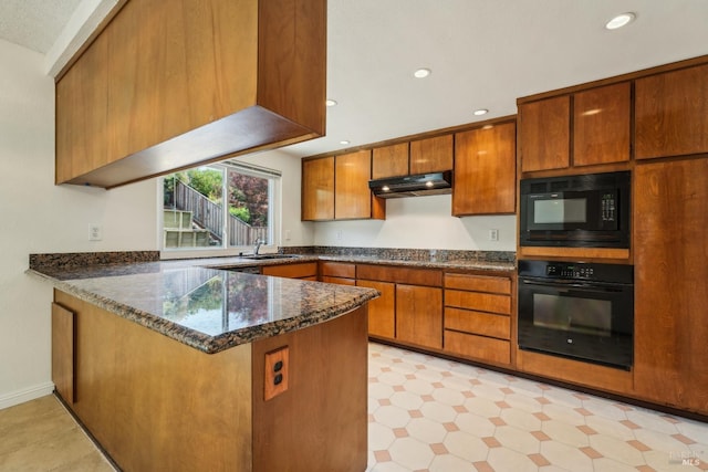 543 Sandy Way, Benicia, CA 94510 - kitchen featuring black appliances, brown cabinetry, a peninsula, dark stone countertops, and recessed lighting