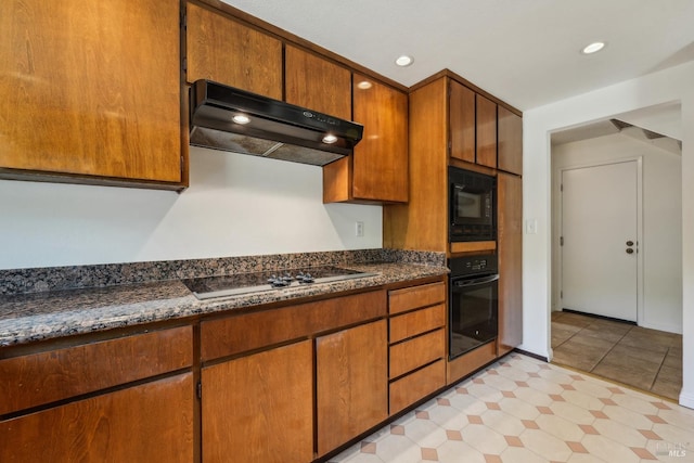 543 Sandy Way, Benicia, CA 94510 - kitchen with black appliances, under cabinet range hood, brown cabinetry, and recessed lighting