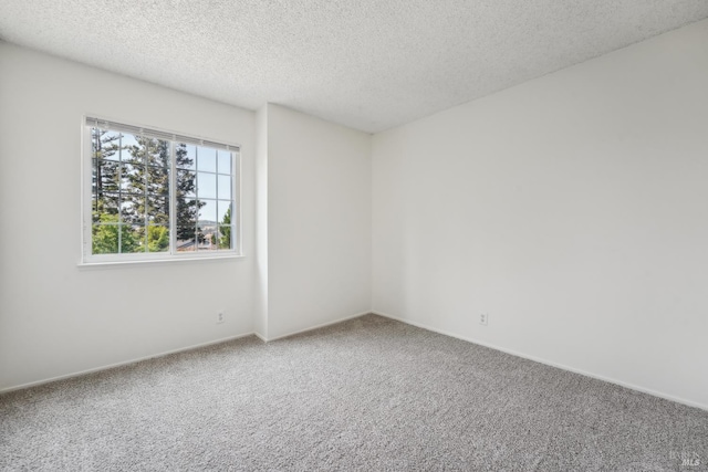 543 Sandy Way, Benicia, CA 94510 - empty room with carpet flooring, a textured ceiling, and baseboards