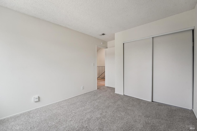 543 Sandy Way, Benicia, CA 94510 - unfurnished bedroom with carpet, a textured ceiling, and a closet