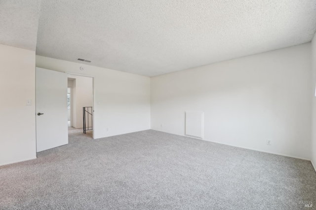 543 Sandy Way, Benicia, CA 94510 - empty room featuring light carpet and a textured ceiling
