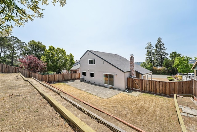 543 Sandy Way, Benicia, CA 94510 - rear view of property featuring a fenced backyard, stucco siding, and a patio
