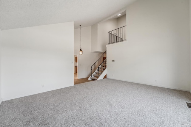 543 Sandy Way, Benicia, CA 94510 - unfurnished living room featuring carpet floors, stairway, baseboards, high vaulted ceiling, and recessed lighting