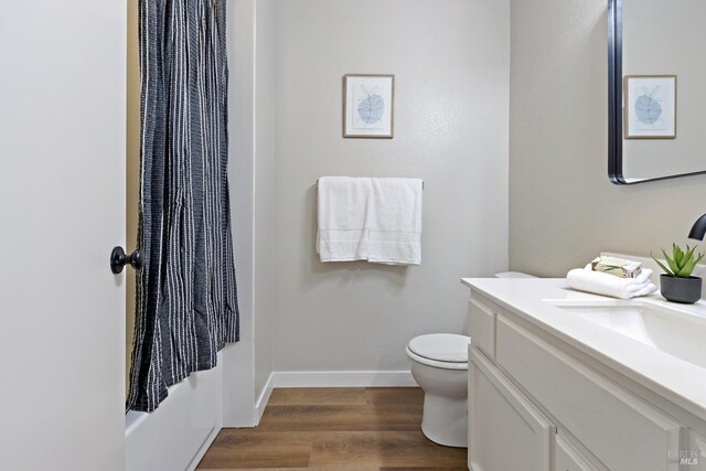 358 Paddlewheel Dr, Vallejo, CA 94591 - bathroom featuring toilet, wood finished floors, vanity, and shower / bath combination with curtain