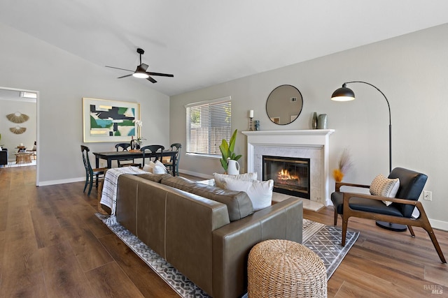 358 Paddlewheel Dr, Vallejo, CA 94591 - living area with dark wood-style floors, ceiling fan, vaulted ceiling, a high end fireplace, and baseboards