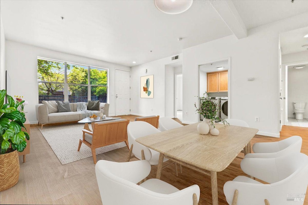 1040 Campoy St Unit 102, Santa Rosa, CA 95407 - dining room with beamed ceiling, washer / clothes dryer, and baseboards