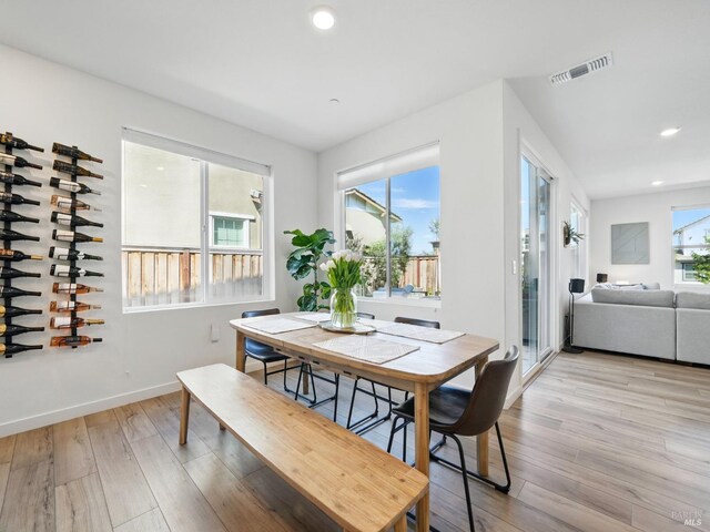 2471 Lake Club Dr, Fairfield, CA 94533 - dining space with light wood-type flooring, baseboards, and recessed lighting