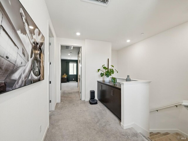 2471 Lake Club Dr, Fairfield, CA 94533 - hallway featuring light carpet, recessed lighting, an upstairs landing, and baseboards