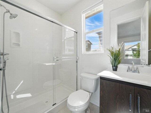2471 Lake Club Dr, Fairfield, CA 94533 - bathroom with a shower stall, toilet, and vanity