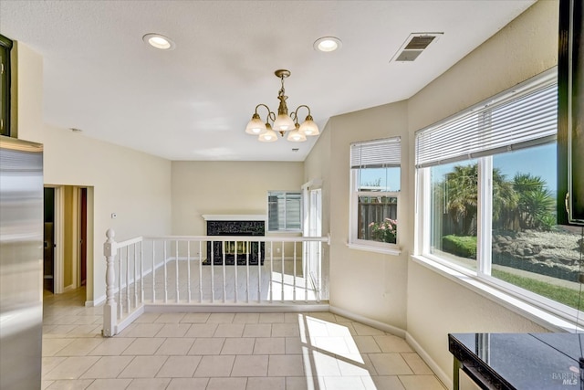 149 Countryview Ct, Vallejo, CA 94591 - unfurnished living room featuring a chandelier, light tile patterned floors, baseboards, and recessed lighting