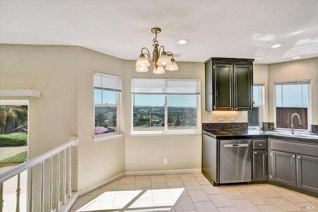 149 Countryview Ct, Vallejo, CA 94591 - kitchen featuring stainless steel dishwasher, a sink, a chandelier, baseboards, and decorative light fixtures