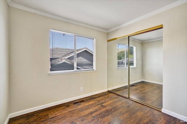 149 Countryview Ct, Vallejo, CA 94591 - unfurnished bedroom with crown molding, wood finished floors, a closet, and baseboards