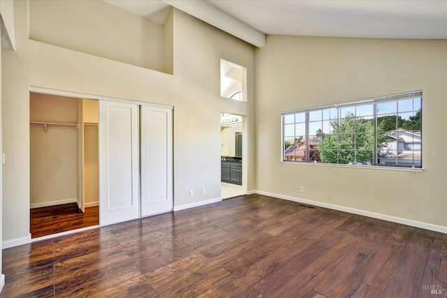 149 Countryview Ct, Vallejo, CA 94591 - unfurnished bedroom featuring wood finished floors, high vaulted ceiling, a closet, and baseboards