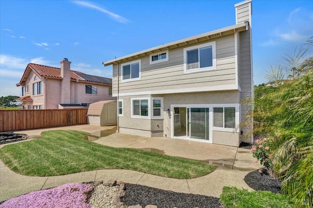 149 Countryview Ct, Vallejo, CA 94591 - back of house featuring a storage shed, a patio, an outbuilding, and a chimney