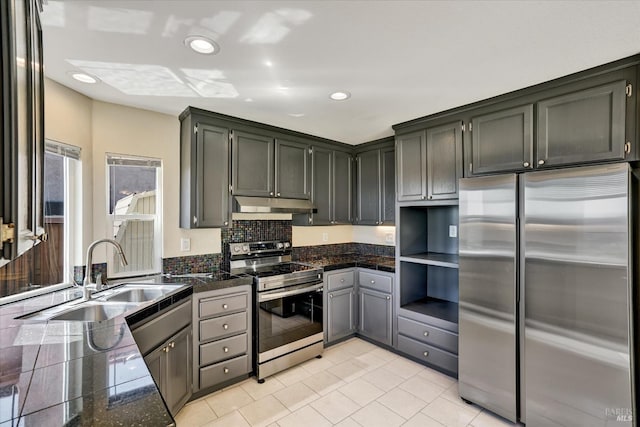 149 Countryview Ct, Vallejo, CA 94591 - kitchen featuring appliances with stainless steel finishes, a sink, under cabinet range hood, tile counters, and recessed lighting