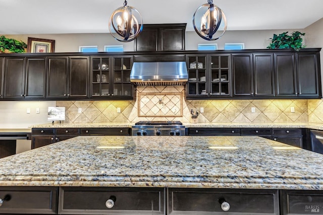 819 Bridle Ridge Dr, Fairfield, CA 94534 - kitchen featuring range hood, light stone countertops, and pendant lighting