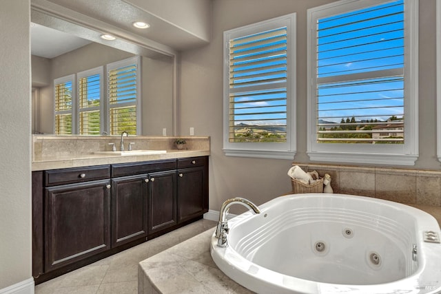 819 Bridle Ridge Dr, Fairfield, CA 94534 - bathroom with a jetted tub, vanity, and tile patterned flooring