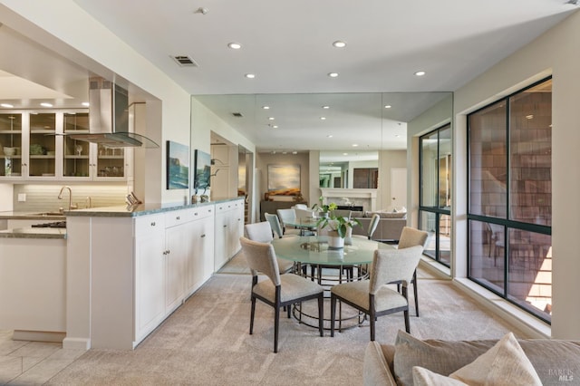 1910 Mar W St, Tiburon, CA 94920 - dining area with recessed lighting and a fireplace