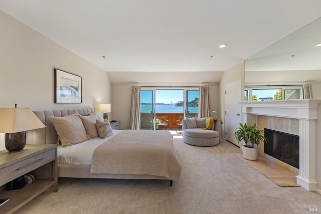 1910 Mar W St, Tiburon, CA 94920 - bedroom with access to exterior, carpet, a tile fireplace, and recessed lighting