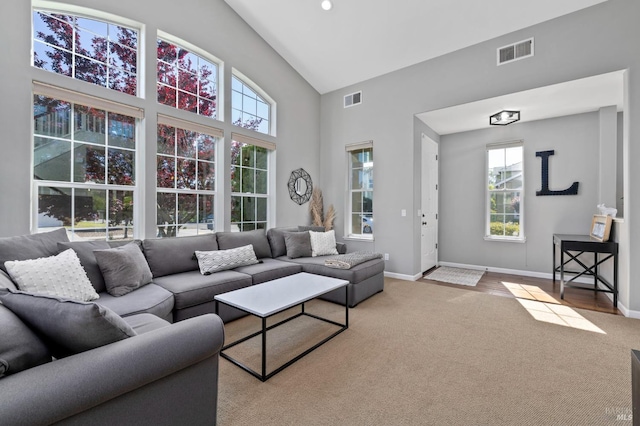 2817 Windmill Dr, Santa Rosa, CA 95403 - carpeted living room with healthy amount of natural light, baseboards, and high vaulted ceiling