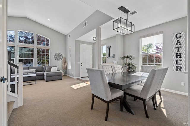 2817 Windmill Dr, Santa Rosa, CA 95403 - dining area featuring carpet flooring, baseboards, a chandelier, and lofted ceiling