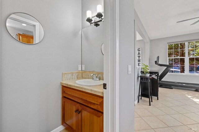2817 Windmill Dr, Santa Rosa, CA 95403 - bathroom featuring tile patterned flooring, vanity, ceiling fan, and baseboards