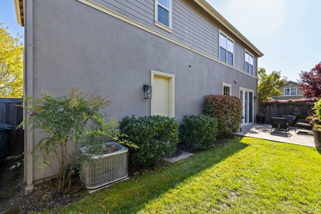 2817 Windmill Dr, Santa Rosa, CA 95403 - rear view of house with a patio area, central air condition unit, and stucco siding