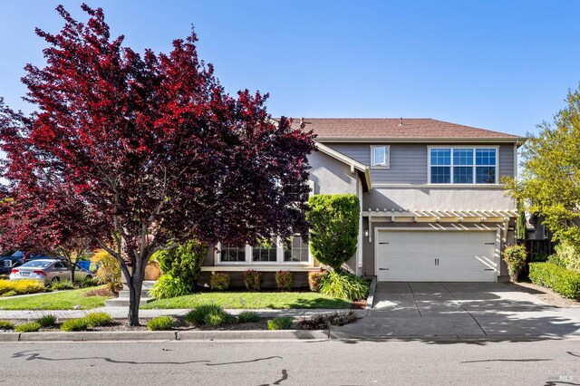 2817 Windmill Dr, Santa Rosa, CA 95403 - view of front of property with a garage, driveway, and stucco siding