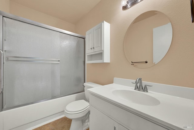 970 El Camino Ave Unit 3, Vacaville, CA 95688 - bathroom featuring vanity, toilet, and bath / shower combo with glass door