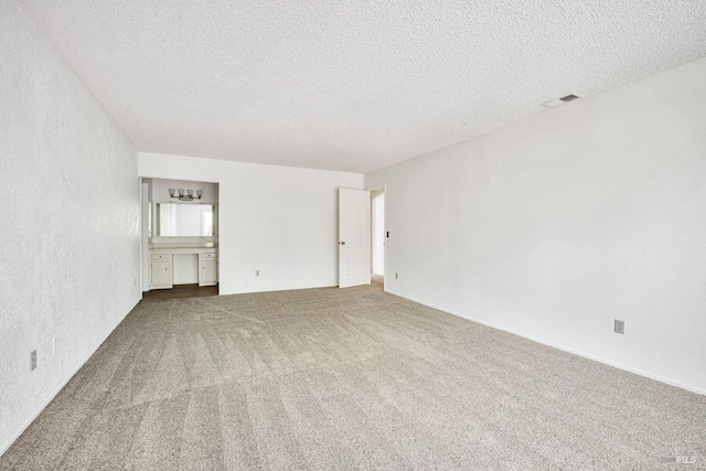 5705 Dexter Cir, Rohnert Park, CA 94928 - carpeted empty room featuring a textured ceiling