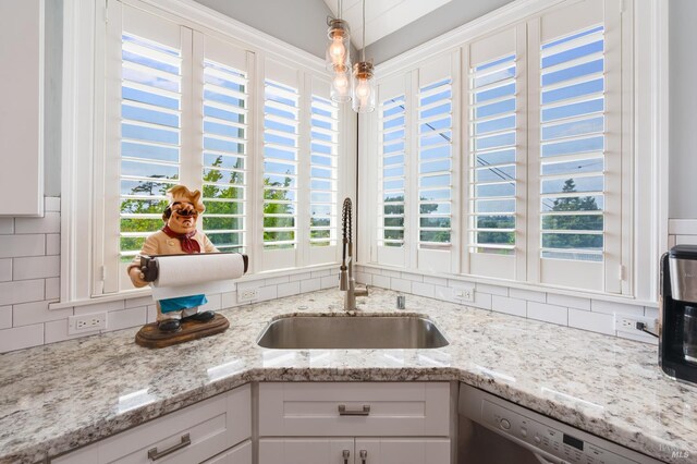 33 Romine Way, Vallejo, CA 94591 - kitchen with a sink, dishwashing machine, decorative backsplash, and white cabinetry