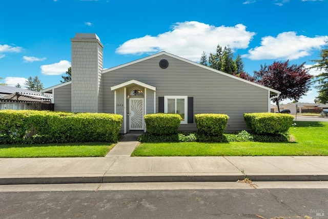 2648 Nut Tree Rd, Vacaville, CA 95687 - view of front of house with a chimney and a front yard