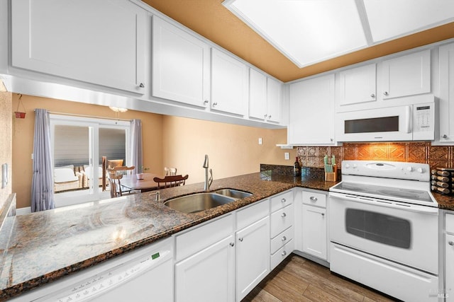 2648 Nut Tree Rd, Vacaville, CA 95687 - kitchen with white appliances, a sink, white cabinetry, and backsplash