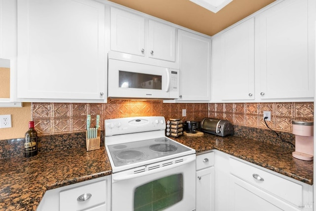2648 Nut Tree Rd, Vacaville, CA 95687 - kitchen featuring white appliances, decorative backsplash, white cabinetry, and dark stone countertops