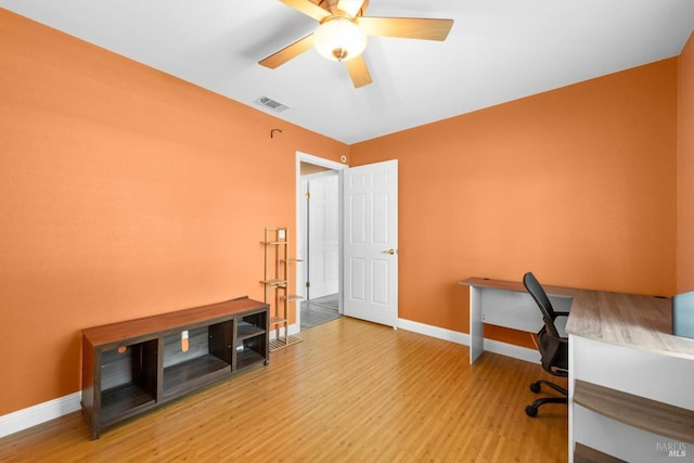 2648 Nut Tree Rd, Vacaville, CA 95687 - unfurnished office with wood finished floors, baseboards, and a ceiling fan
