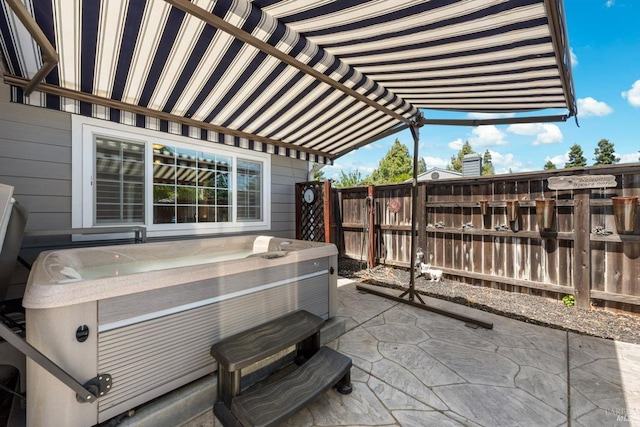 2648 Nut Tree Rd, Vacaville, CA 95687 - view of patio / terrace with a hot tub and fence