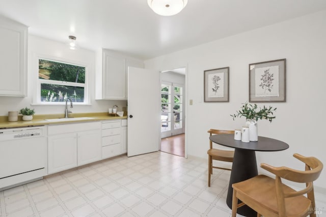 1400 High School Rd, Sebastopol, CA 95472 - kitchen featuring white dishwasher, a sink, light countertops, light floors, and white cabinetry