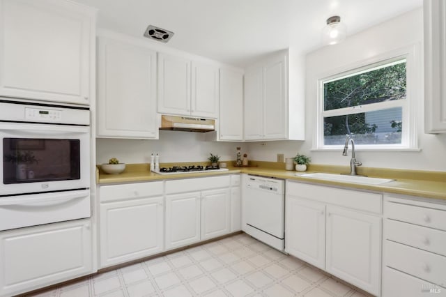 1400 High School Rd, Sebastopol, CA 95472 - kitchen featuring white appliances, a warming drawer, a sink, and light countertops