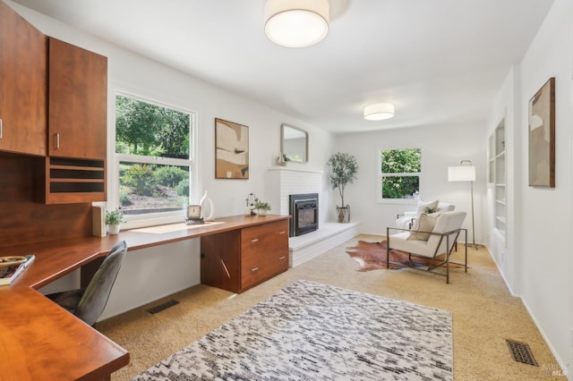 1400 High School Rd, Sebastopol, CA 95472 - office space featuring light carpet, a fireplace, and built in desk