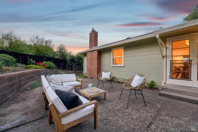 1400 High School Rd, Sebastopol, CA 95472 - patio terrace at dusk featuring an outdoor hangout area and a fenced backyard