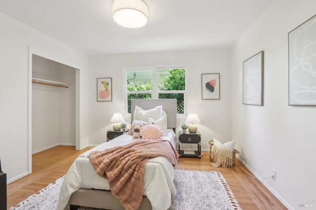 1400 High School Rd, Sebastopol, CA 95472 - bedroom featuring wood finished floors, a closet, and baseboards
